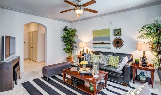 a living room with a couch and a table